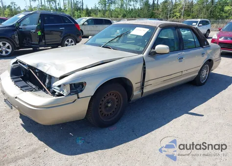 1999 Mercury Grand Marquis Gs из США, поврежденный, VIN 2MEFM74W4XX608720